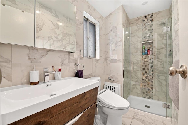 740 Eagle Dr, North Woodmere, NY 11581 - full bathroom featuring a shower stall, vanity, marble look tiles, and tile walls
