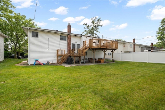 740 Eagle Dr, North Woodmere, NY 11581 - rear view of house featuring stairs, a wooden deck, a chimney, and a patio