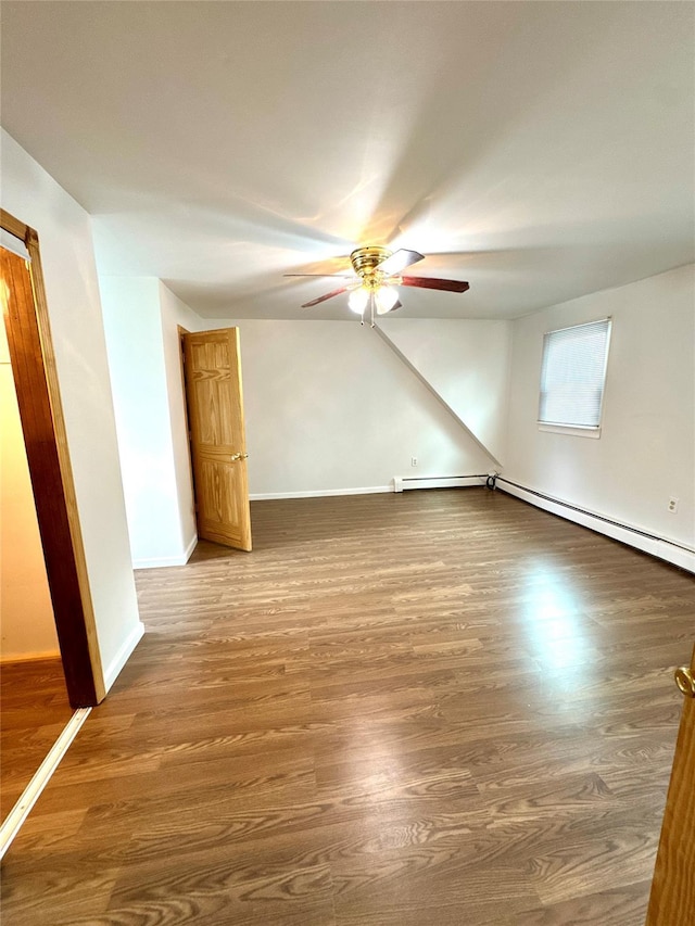 21 Maple Dr, Middletown, NY 10940 - empty room with a ceiling fan, wood finished floors, and a baseboard radiator