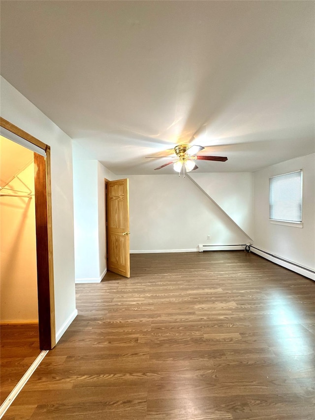 21 Maple Dr, Middletown, NY 10940 - unfurnished living room featuring a ceiling fan, wood finished floors, and baseboard heating