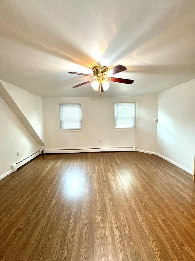 21 Maple Dr, Middletown, NY 10940 - spare room featuring a ceiling fan, wood finished floors, and a baseboard radiator