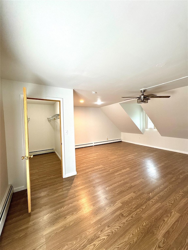 21 Maple Dr, Middletown, NY 10940 - additional living space featuring baseboard heating, a baseboard heating unit, wood finished floors, ceiling fan, and lofted ceiling