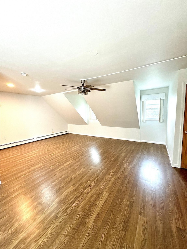 21 Maple Dr, Middletown, NY 10940 - additional living space with dark wood-style flooring, ceiling fan, a baseboard radiator, and lofted ceiling