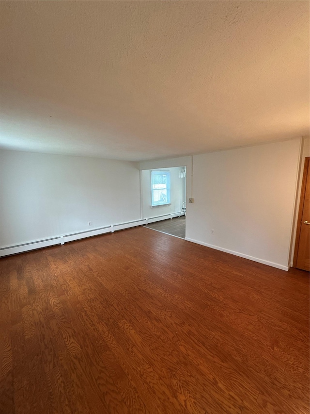 21 Maple Dr, Middletown, NY 10940 - unfurnished room featuring dark wood finished floors and a textured ceiling