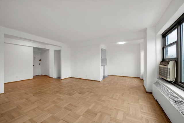 21-15 34th Ave Unit 8B, Astoria, NY 11106 - unfurnished room featuring baseboards