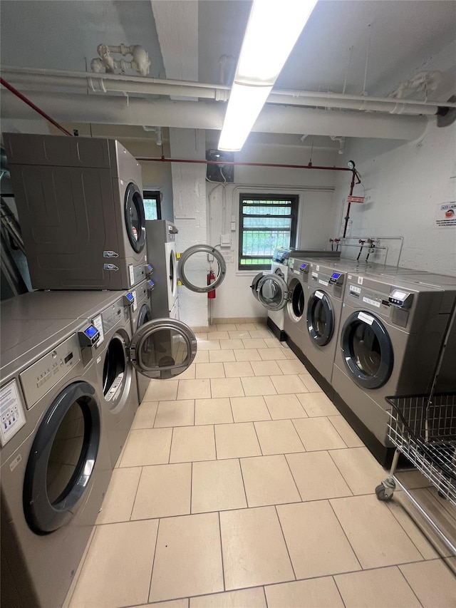 21-15 34th Ave Unit 8B, Astoria, NY 11106 - community laundry room with estacked washer and dryer and independent washer and dryer