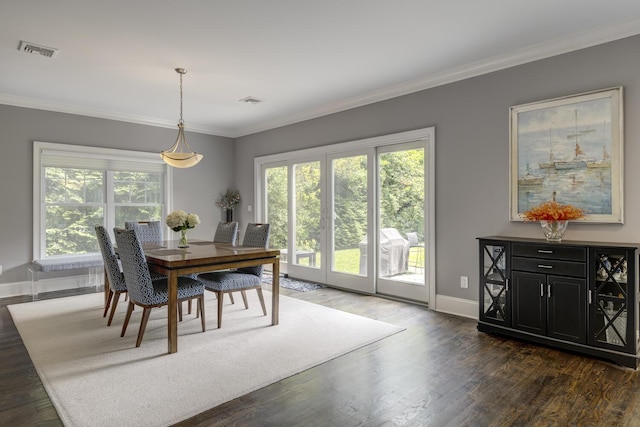 28 Weir Ln, Locust Valley, NY 11560 - dining space with dark wood-type flooring and ornamental molding