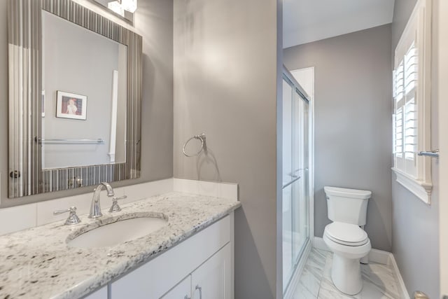 28 Weir Ln, Locust Valley, NY 11560 - full bathroom with healthy amount of natural light, vanity, a shower stall, and marble finish flooring