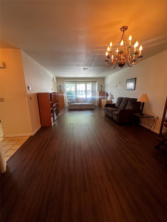 60 Revere Dr, Sayville, NY 11782 - living area with a chandelier and dark wood-type flooring
