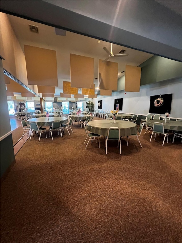60 Revere Dr, Sayville, NY 11782 - dining room with carpet floors and a ceiling fan