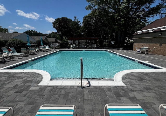 60 Revere Dr, Sayville, NY 11782 - community pool with a patio area