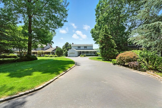 2005 Westview Dr, Mattituck, NY 11952 - view of front of property with a detached garage and a front yard