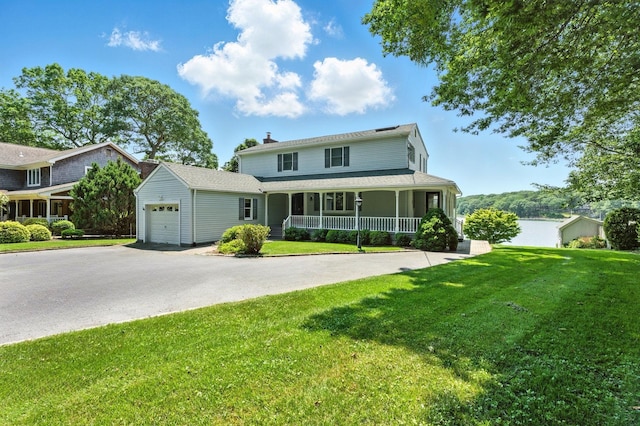 2005 Westview Dr, Mattituck, NY 11952 - farmhouse inspired home with covered porch, a garage, driveway, and a front yard