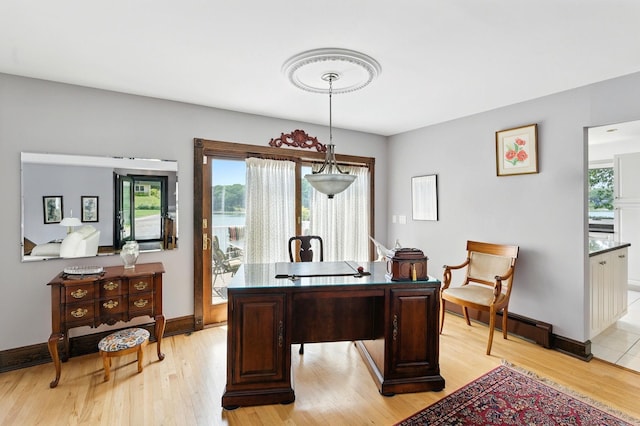2005 Westview Dr, Mattituck, NY 11952 - office with light wood-style floors and a baseboard heating unit