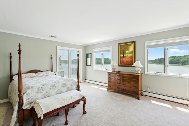 2005 Westview Dr, Mattituck, NY 11952 - carpeted bedroom featuring a baseboard heating unit, crown molding, and access to outside