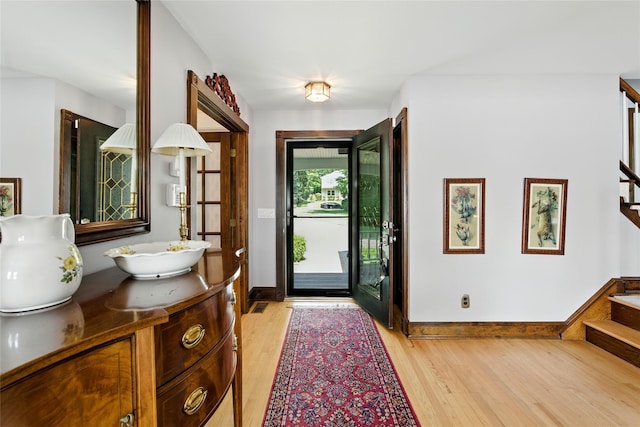 2005 Westview Dr, Mattituck, NY 11952 - entrance foyer featuring stairs and light wood-type flooring