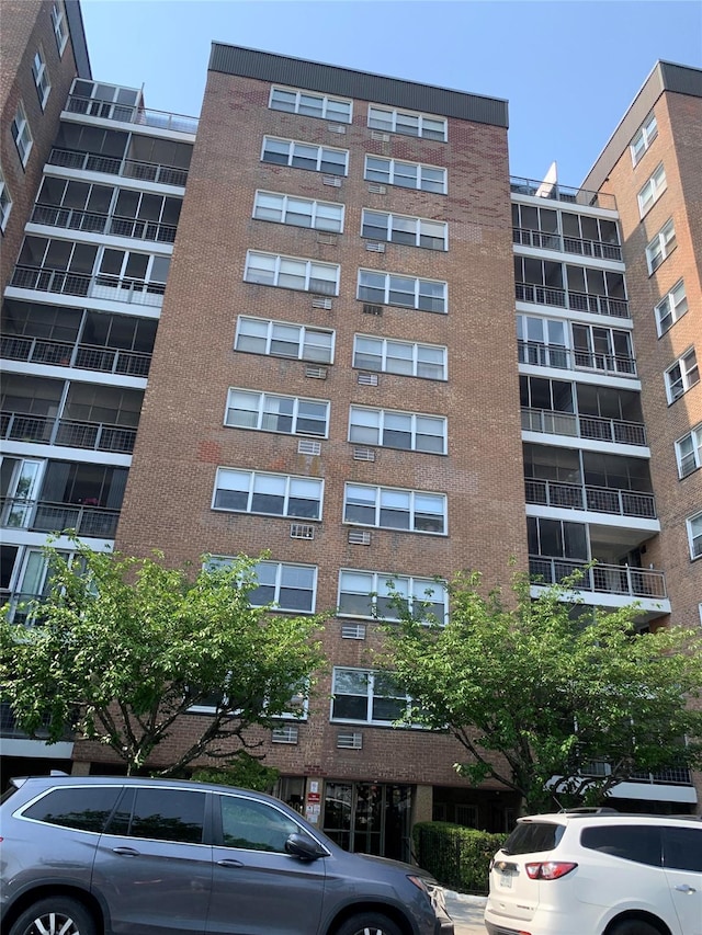 90-59 56th Ave Unit 9M, Elmhurst, NY 11373 - view of apartment building / complex