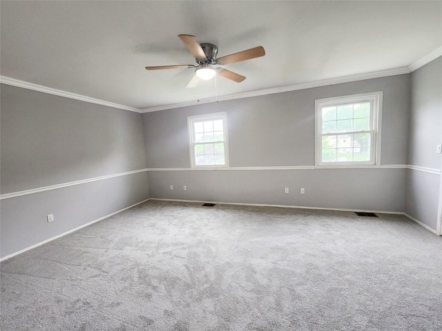 12 Grouse Path, Coram, NY 11727 - unfurnished room with ornamental molding, a ceiling fan, and carpet floors