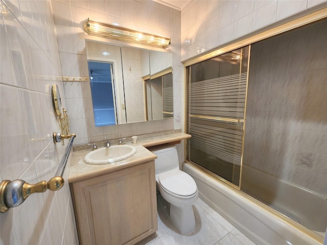12 Grouse Path, Coram, NY 11727 - full bath featuring tile patterned flooring, vanity, tile walls, combined bath / shower with glass door, and tasteful backsplash