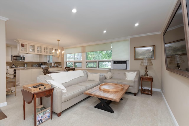 18 Channing Pl Unit 2R, Eastchester, NY 10709 - living room featuring ornamental molding, recessed lighting, light carpet, cooling unit, and a chandelier