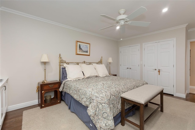 18 Channing Pl Unit 2R, Eastchester, NY 10709 - bedroom with two closets, wood finished floors, crown molding, and ceiling fan