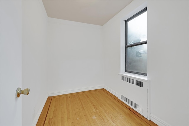 2506 Davidson Ave Unit 3C, Bronx, NY 10468 - spare room with radiator and wood finished floors