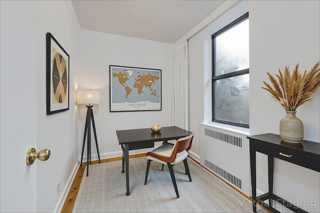 2506 Davidson Ave Unit 3C, Bronx, NY 10468 - dining space with radiator heating unit and light wood-style floors