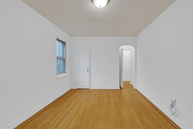 2506 Davidson Ave Unit 3C, Bronx, NY 10468 - unfurnished room featuring arched walkways and light wood-style floors