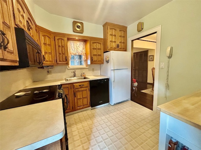 163-49 16th Ave, Whitestone, NY 11357 - kitchen with black appliances, light countertops, and brown cabinets