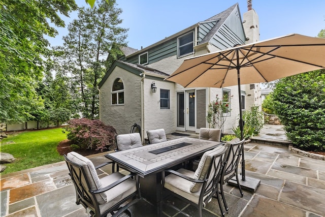 100 Norman Rd, New Rochelle, NY 10804 - view of patio featuring outdoor dining area and french doors