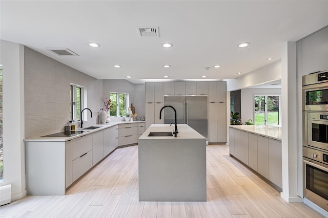 12 Zeck Ct, Suffern, NY 10901 - kitchen with modern cabinets, gray cabinets, built in refrigerator, and recessed lighting
