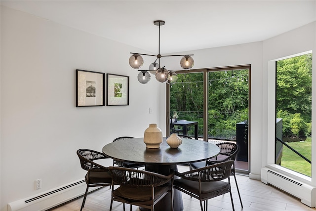12 Zeck Ct, Suffern, NY 10901 - dining room with baseboard heating and a chandelier