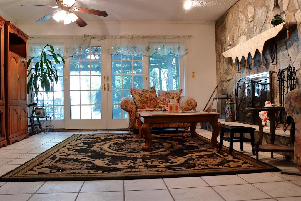 8 Violet Ave, Hicksville, NY 11801 - sitting room with light tile patterned floors, a ceiling fan, and ornamental molding