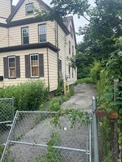 111 S Fulton Ave, Mount Vernon, NY 10550 - view of side of home featuring a gate