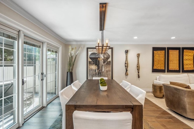 10 Pond View Ct Unit 10, Jericho, NY 11753 - dining space with a chandelier, wood finished floors, crown molding, and recessed lighting