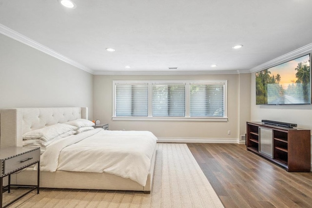 10 Pond View Ct Unit 10, Jericho, NY 11753 - bedroom with ornamental molding, wood finished floors, and recessed lighting