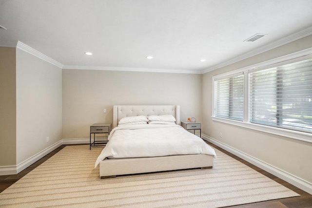 10 Pond View Ct Unit 10, Jericho, NY 11753 - bedroom with wood finished floors, recessed lighting, and crown molding