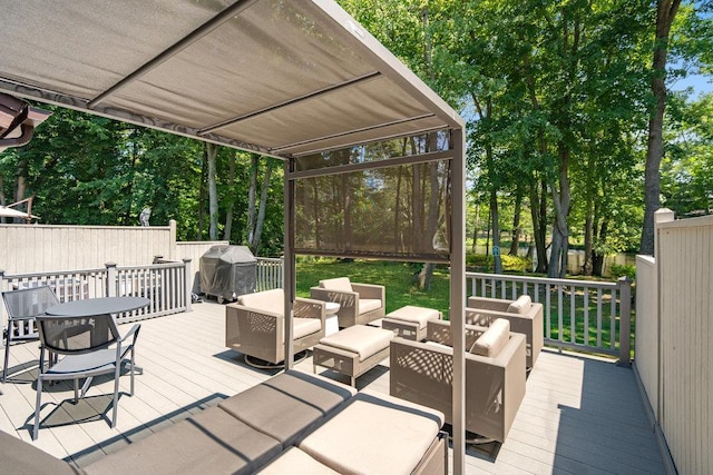 10 Pond View Ct Unit 10, Jericho, NY 11753 - deck with an outdoor hangout area, grilling area, and view of wooded area