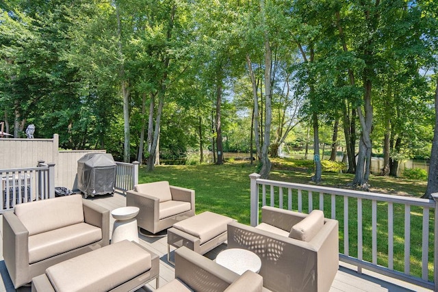 10 Pond View Ct Unit 10, Jericho, NY 11753 - wooden deck with an outdoor living space, grilling area, a yard, and view of wooded area
