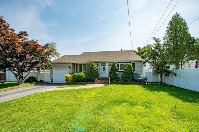 163 W 24th St, Deer Park, NY 11729 - ranch-style house featuring a garage, asphalt driveway, and roof with shingles