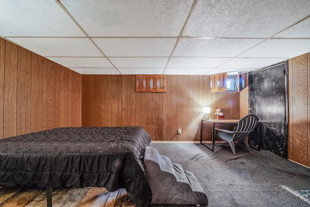 35 13th St, Bohemia, NY 11716 - bedroom with a drop ceiling, wood walls, and carpet