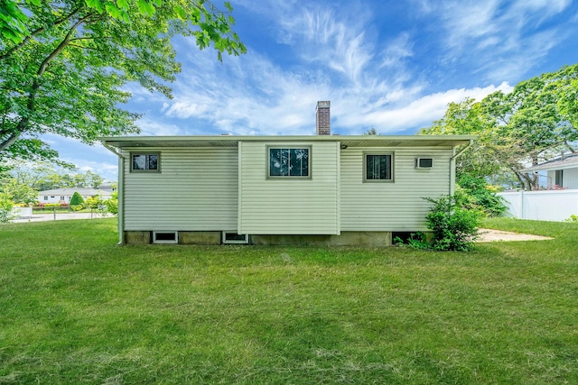35 13th St, Bohemia, NY 11716 - back of property with a chimney