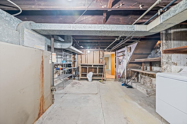 66-13 73rd Pl, Middle Village, NY 11379 - unfinished below grade area featuring washer / dryer