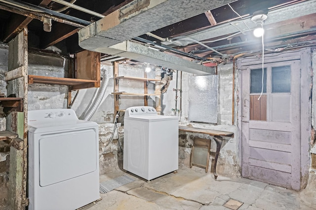 66-13 73rd Pl, Middle Village, NY 11379 - unfinished below grade area featuring washer and clothes dryer