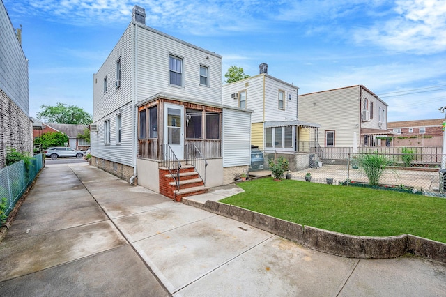 66-13 73rd Pl, Middle Village, NY 11379 - rear view of property featuring entry steps