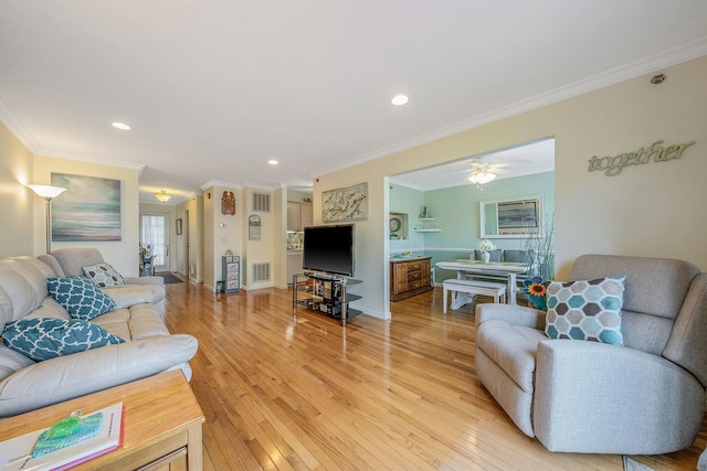 903 Constance Ln, Port Jefferson Station, NY 11776 - living room with crown molding, light wood finished floors, recessed lighting, and a ceiling fan