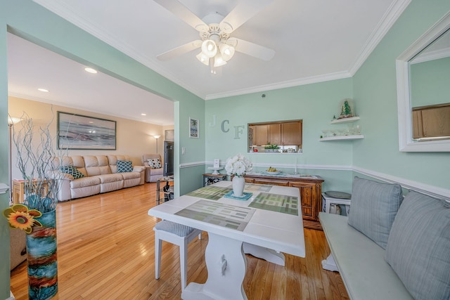 903 Constance Ln, Port Jefferson Station, NY 11776 - dining space with crown molding, ceiling fan, light wood-style floors, and recessed lighting