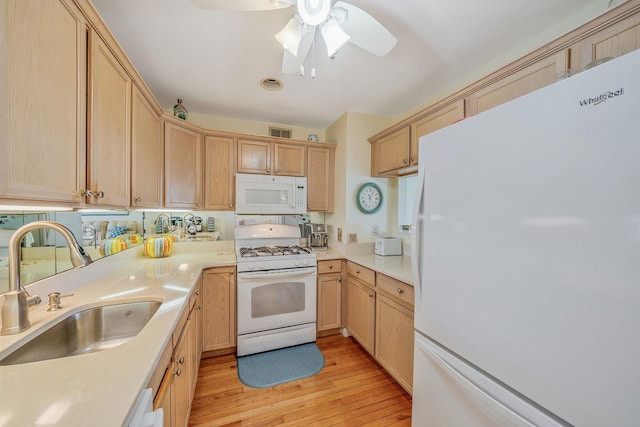 903 Constance Ln, Port Jefferson Station, NY 11776 - kitchen with white appliances, light wood-type flooring, light brown cabinetry, a ceiling fan, and light countertops
