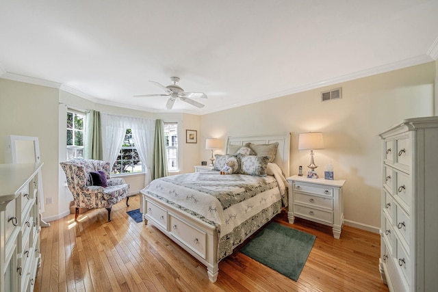 903 Constance Ln, Port Jefferson Station, NY 11776 - bedroom with light wood finished floors, ornamental molding, and ceiling fan