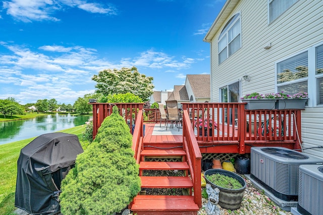 903 Constance Ln, Port Jefferson Station, NY 11776 - deck with a water view and grilling area